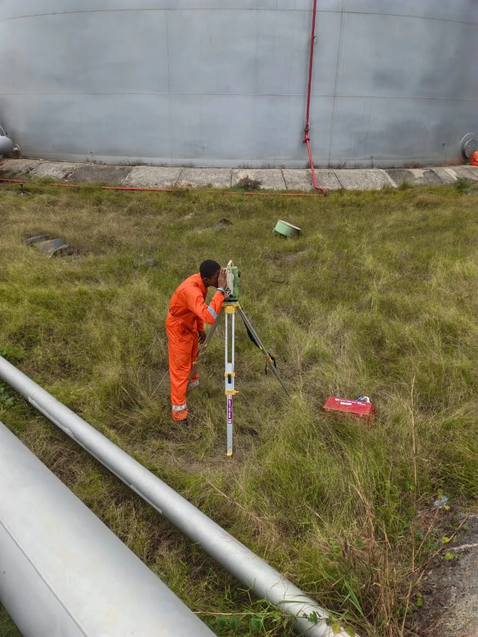 Gasontex surveyor taking site measurements before rehabilitation work